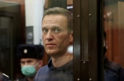 FILE PHOTO: Russian opposition leader Navalny attends a court hearing in Moscow