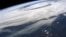 Kolom asap (bawah) dari kebakaran lahan di dan sekitar Ft McMurray, Alberta, Kanada, terlihat dalam foto yang diabadikan oleh astronot NASA, Jeff Williams, dari Stasiun Luar Angkasa Internasional, 11 Mei 2016.
