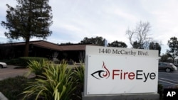 FILE - This Feb. 11, 2015, photo shows FireEye offices in Milpitas, California.