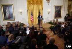 U.S. President Donald Trump speaks during a working session with mayors in the East Room of the White House, Jan. 24, 2018.