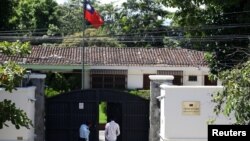 A man walks in the Taiwan embassy a day after the Salvadoran government announced that it has broken off diplomatic relations with Taiwan, in San Salvador, El Salvador, Aug. 21, 2018. 