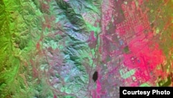 California's San Andreas Fault region captured by the HyspIRI airborne campaign equipment, March 29, 2013: Red areas are composed of minerals high in silica, such as urban areas; darker and cooler areas are composed of water and heavy vegetation, NASA file image.