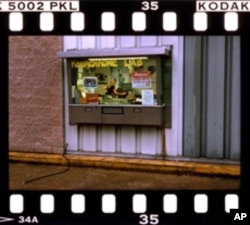 This place in Kansas is the last place in America where you can take Kodachrome film for developing. But that sign will be changed or removed at year's end.