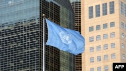 FILE - The United Nations flag is seen at the United Nations General Assembly Hall in New York City, Sept. 23, 2019.