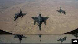 This picture released by the French Army Communications Audiovisual office shows French aircraft flying to N'Djamena overnight January 11 to 12, after taking off from Nancy.