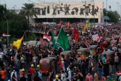 Anti-government protesters gather during a demonstration in Baghdad, Iraq, Oct. 29, 2019.