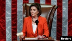 Speaker of the House Nancy Pelosi wields the gavel as she presides over the U.S. House of Representatives vote on a resolution that sets up the next steps in the impeachment inquiry of President Donald Trump on Capitol Hill in Washington, Oct. 31, 2019.