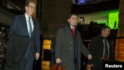 Under Secretary for International Affairs David Malpass of the U.S. Department of the Treasury and other members of the U.S. trade delegation to China, return from talks to a hotel in Beijing, Jan. 7, 2019.