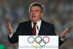 FILE - International Olympic Committee (IOC) President Thomas Bach delivers a speech during the closing ceremony of the 2014 Nanjing Youth Olympic Games in Nanjing, Jiangsu province, August 2014.