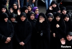 Women mourn during the funeral of top Hezbollah commander Mustafa Badreddine, who was killed in an attack in Syria, in Beirut's southern suburbs, Lebanon, May 13, 2016.