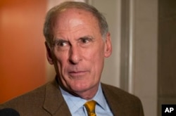 FILE - Sen. Dan Coats, R-Ind. speaks on Capitol Hill in Washington, Dec. 31, 2012.