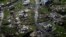 Destroyed communities are seen in the aftermath of Hurricane Maria in Toa Alta, Puerto Rico, Thursday, Sept. 28, 2017. The aftermath of the powerful storm has resulted in a near-total shutdown of the U.S. territory’s economy that could last for weeks and has many people running seriously low on cash and worrying that it will become even harder to survive on this storm-ravaged island.