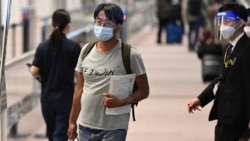 រូបឯកសារ៖ អ្នកកាសែត​ជនជាតិ​ជប៉ុន​លោក Yuki Kitazumi ដែល​ត្រូវបាន​ចាប់ខ្លួន​ដោយ​កងកម្លាំង​សន្តិសុខ​មីយ៉ាន់ម៉ា បាន​ទៅដល់​អាកាស​យានដ្ឋាន Naritaនៅ​ប្រទេស​ជប៉ុន កាលពី​ថ្ងៃទី១៤ ខែឧសភា ឆ្នាំ២០២១ ក្រោយពី​លោក​ត្រូវបាន​ដោះលែង​ពីពន្ធនាគារ​នៅ​ប្រទេស​មីយ៉ាន់ម៉ា។