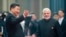FILE - Chinese President Xi Jinping, left, welcomes Indian Prime Minister Narendra Modi for a meeting at a Shanghai Cooperation Organization summit in Qingdao in eastern China's Shandong province, June 10, 2018. 