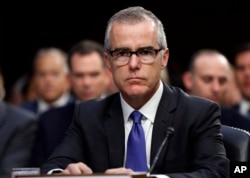 FILE - Then-Acting FBI Director Andrew McCabe appearing before a Senate Intelligence Committee hearing about the Foreign Intelligence Surveillance Act, on Capitol Hill in Washington, June 7, 2017.