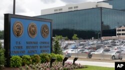 Batoul Bashir Ahmad, a five-month-old child suffering from dehydration, is carried by his mother, a displaced Iraqi woman who fled her home during a battle between Iraqi forces and Islamic State militants, in Mosul.