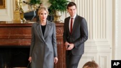 FILE - Ivanka Trump, daughter of President Donald Trump and her husband, senior adviser Jared Kushner, arrive in the East Room of the White House in Washington, Feb. 15, 2017.