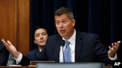 FILE - Rep. Sean Duffy, R-Wis., speaks during a hearing July 18, 2018, on Capitol Hill in Washington. President-elect Donald Trump has nominated Duffy to be Transportation Secretary. 