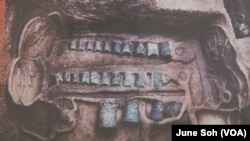 This bianzhong (meaning "ordered bells") is seen as it was excavated from the tomb of a duke of Zheng State (approximately 2,500-2,800 years ago) illustrates the extravagance of noble families.