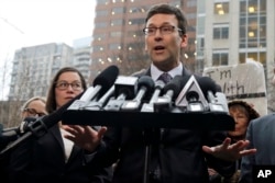 Washington Attorney General Bob Ferguson talks to reporters Feb. 3, 2017, following a hearing in federal court in Seattle. A U.S. judge on Friday temporarily blocked President Donald Trump's ban on people from seven predominantly Muslim countries.