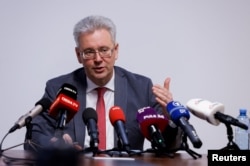 Yevhenii Tsymbaliuk, Permanent Representative of Ukraine to the IAEA addresses a news conference, in Vienna