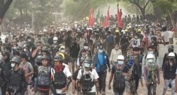 Demonstrators march in an anti-coup protest in Monywa, the capital of Sagaing Region, Myanmar, March 31, 2021. (Credit: VOA Burmese Service)