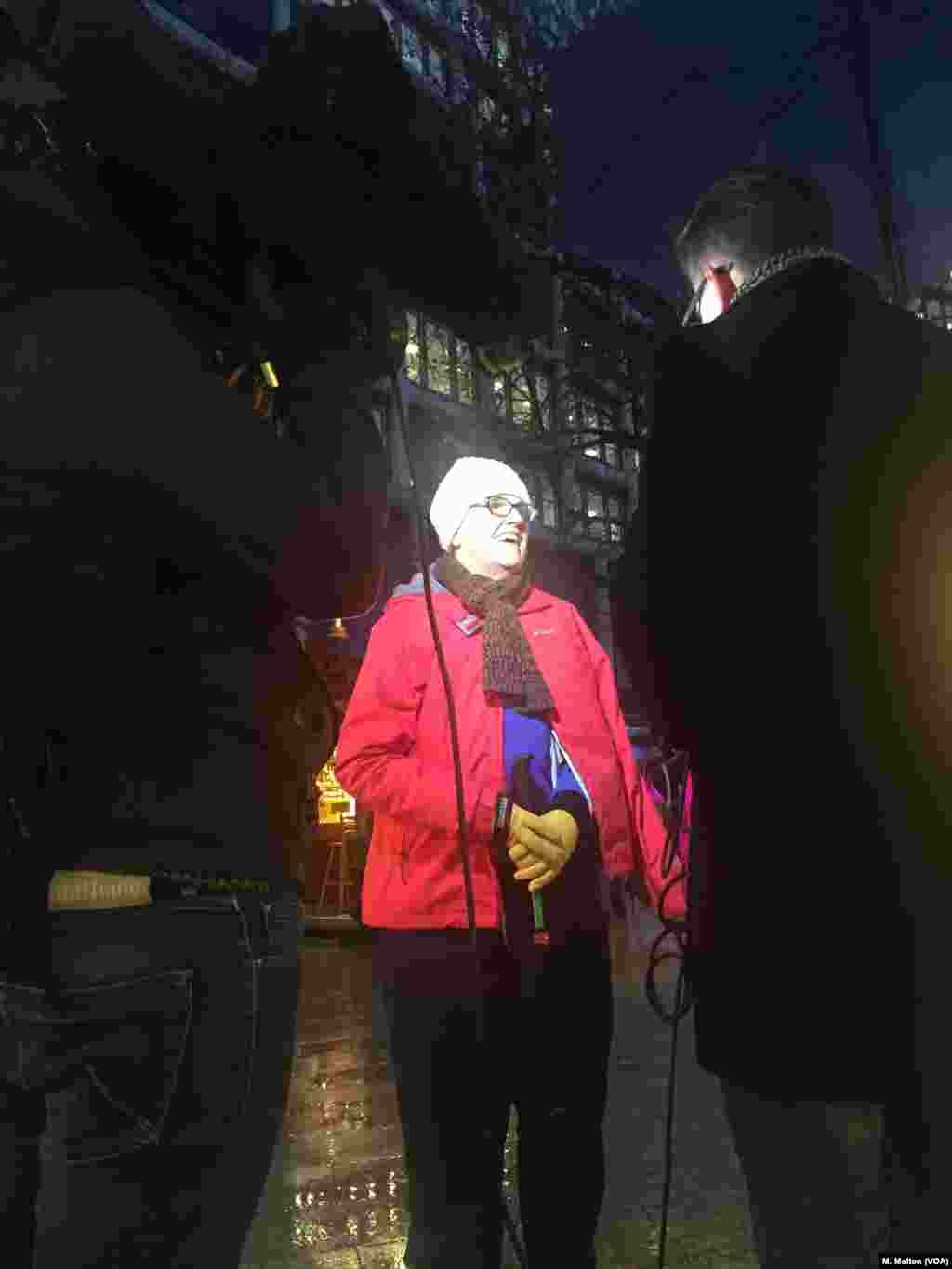 Local and international media were on the scene to mark the opening of Berlin's Christmas markets, asking shoppers if they remembered last year's attack and whether they felt safe at the market, Nov. 27, 2017.