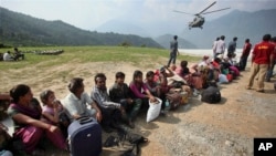 Wadanda ambaliyar ruwa ya rutsa da su a kasar Indiya 