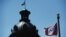 The Confederate flag flies near the South Carolina Statehouse in Columbia, S.C., June 19, 2015.