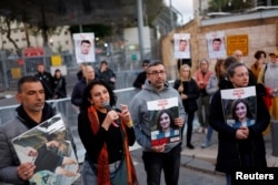 FILE - Meirav Leshem Gonen, mother of hostage Romi Gonen, speaks at a rally calling for the hostages' release, amid the ongoing conflict in Gaza between Israel and Hamas, outside the Israeli Ministry of Defense, in Tel Aviv, Israel, March 7, 2024.