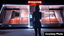 The Moby Mart driverless vehicle is being tested in Shanghai, China. It allows users to request the robot through an app, then step inside to buy desired items. (Himalafy/Wheelys)