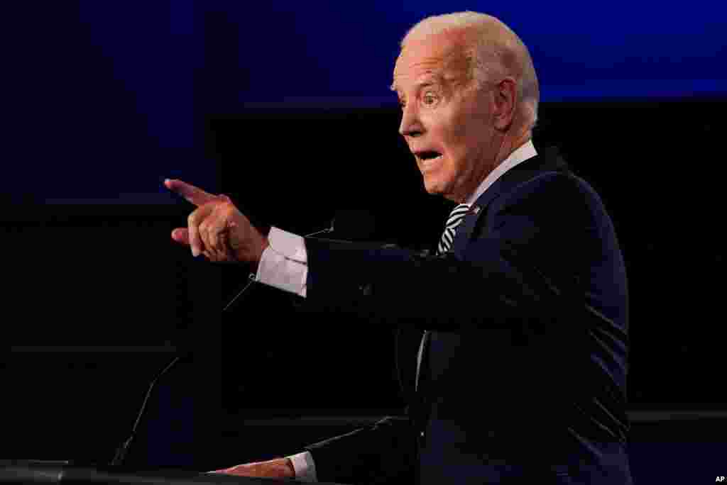 Democratic presidential candidate former Vice President Joe Biden gestures while speaking during the first presidential debate Tuesday, Sept. 29, 2020, at Case Western University and Cleveland Clinic, in Cleveland, Ohio. (AP Photo/Julio Cortez)