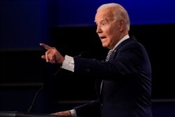 Democratic presidential candidate former Vice President Joe Biden gestures while speaking during the first presidential debate, Sept. 29, 2020, at Case Western University and Cleveland Clinic, in Cleveland, Ohio.