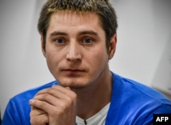 Maxim Lapunov giving a press conference in Moscow on October 16, 2017 on his detention and torture by police during a crackdown on gay men in Chechnya.