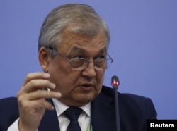 Russian President Vladimir Putin's envoy for Syria Aleksandr Lavrentyev speaks during a news conference at the end of the Syrian Congress of National Dialogue in the Black Sea resort of Sochi, Russia Jan. 30, 2018.