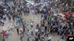 Egyptian protesters gather outside the country's high court in Cairo, Egypt, Nov. 24, 2012. 