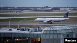 A United Airlines plane lands at O'Hare International Airport in Chicago, Illinois, April 11, 2017.