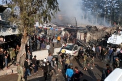 A released by the Syrian Civil Defense rescue workers shows the scene of a fuel truck bomb which killed 36 people including at least six Turkey-backed rebel fighters on April 28, 2020 in northern Syrian city of Afrin, controlled by Ankara's proxies.