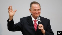 Former Alabama Chief Justice and U.S. Senate candidate Roy Moore speaks at a revival, Nov. 14, 2017, in Jackson, Alabama.
