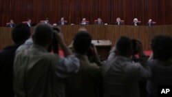 Judges sit in the Superior Electoral Court during the judgment phase of a trial involving allegations that the 2014 Rousseff-Temer ticket received illegal campaign financing in Brasilia, Brazil, June 6, 2017. 
