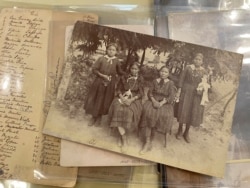 FILE - This July 8, 2021, image of material archived at the Center for Southwest Research at the University of New Mexico in Albuquerque, New Mexico, shows a group of unidentified Indigenous students in the late 19th century.