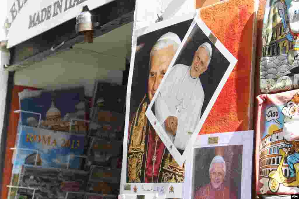 Souvenir pictures and posters of Pope Emeritus Benedict for sale near the Vatican, March 3, 2013. 