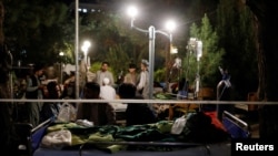 Deadly Afghans injured during the recent earthquake receive treatment at a hospital compound in Herat, Afghanistan October 8, 2023.