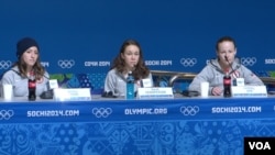 U.S. ski jumpers Jessica Jerome, Sarah Hendrickson and Lindsey Van speak to the media in Sochi, Feb. 10, 2014. (Parke Brewer/VOA)