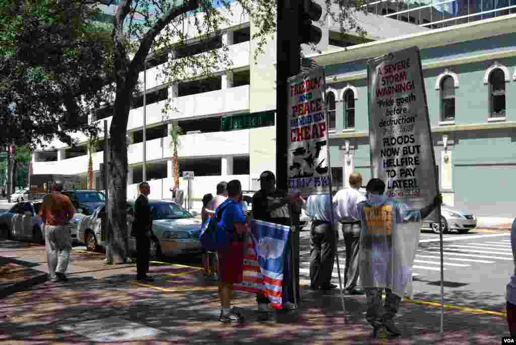 Protesters outside the Republican National Convention, Tampa, Florida, August 28, 2012. (J. Featherly/VOA)