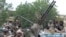 (FILES) A picture taken on June 21, 2008 shows Chadian soldiers parading in N'djamena.Rebels waging an offensive in the Central African Republic seized Kaga-Bandoro, another major town, on Dec. 25, 2012.