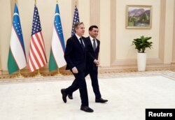 U.S Secretary of State Antony Blinken, left, meets with Uzbekistan Acting Foreign Minister Bakhtiyor Saidov at the National Library in Tashkent, Uzbekistan, on March 1, 2023.