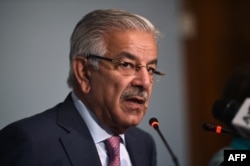 FILE - Pakistani Foreign Minister Khawaja Asif briefs the media in Islamabad, Pakistan, Sep. 7, 2017.