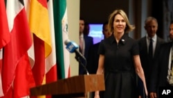 New U.S. Ambassador Kelly Craft walks to the podium to address the press after attending her first Security Council meeting, at United Nations headquarters, in New York, Sept. 12, 2019. 