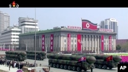 In this image made from video provided by North Korean broadcaster KRT, missiles are displayed during a parade at Kim Il Sung Square in Pyongyang, April 15, 2017.
